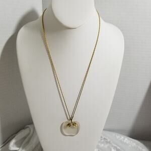 Avon gold tone clear apple 22"-1 1/2" wide pendant 1.1401
